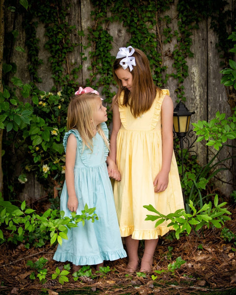 Girls yellow shop pinafore